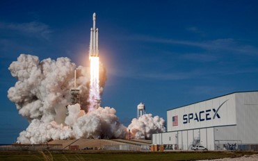 SpaceX rocket booster returning to its launch site