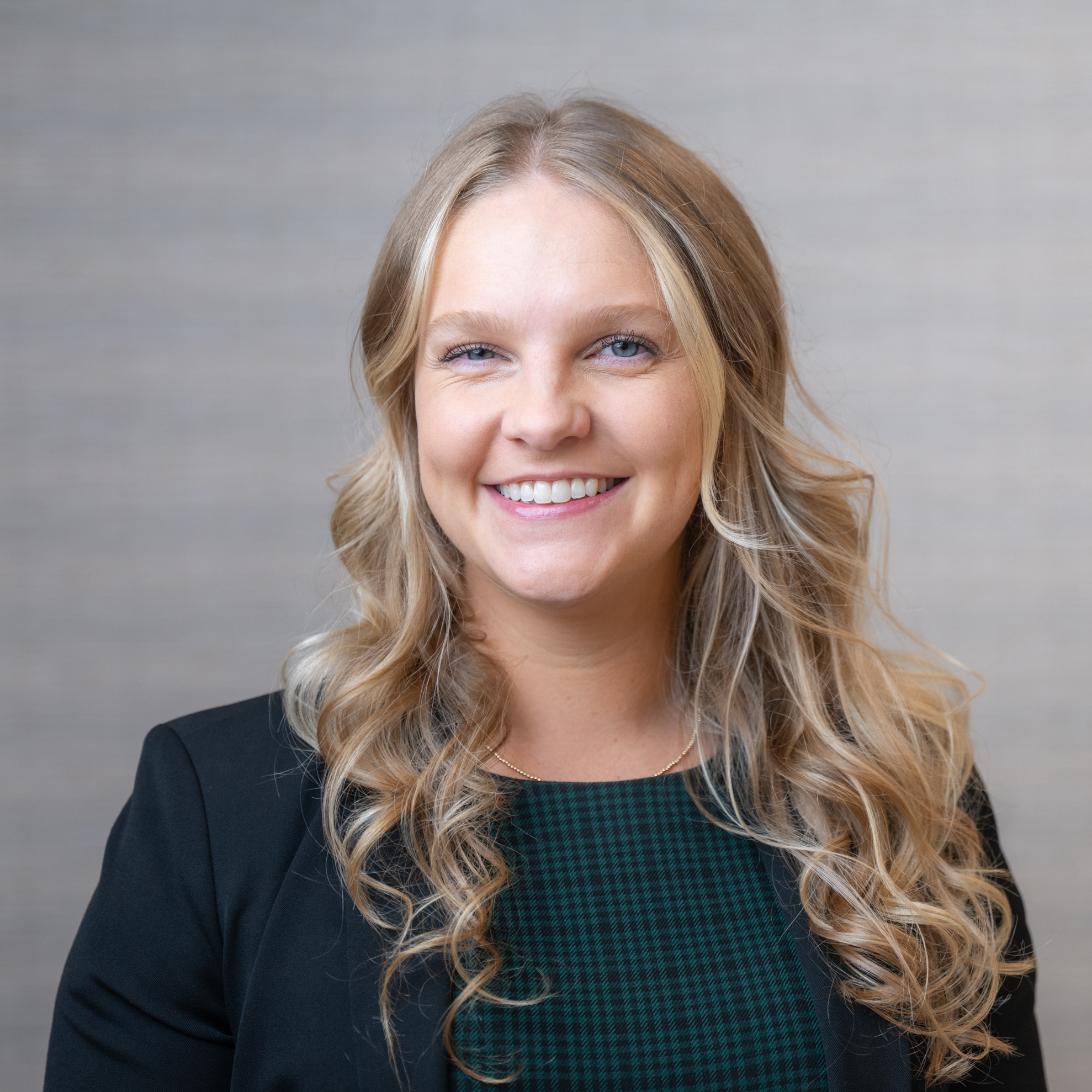 Portrait of Kelly Walker, CFP®, Principal & Chief Compliance Officer at Naples Global Advisors